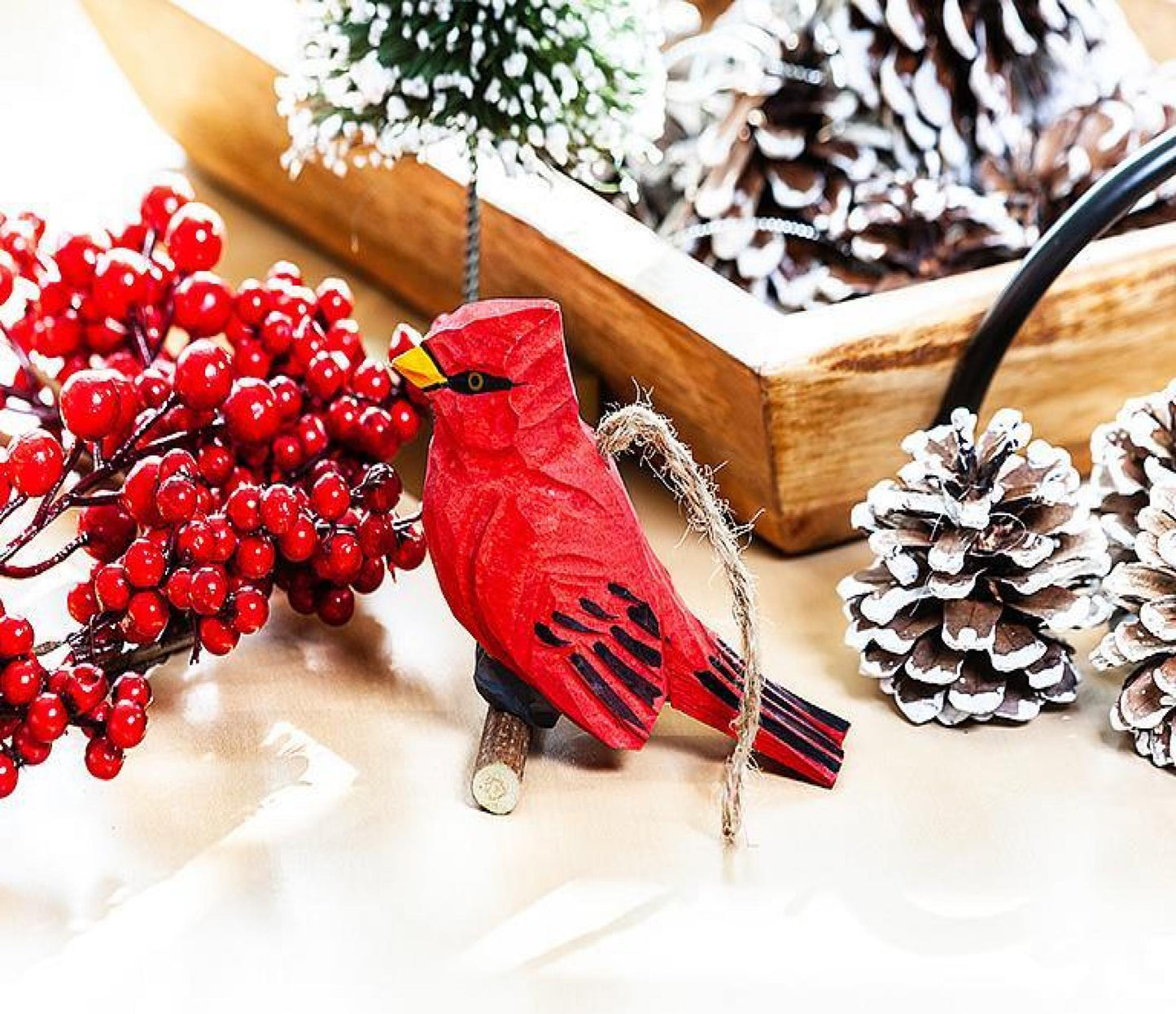 Carved Cardinal On A A Branch Ornament