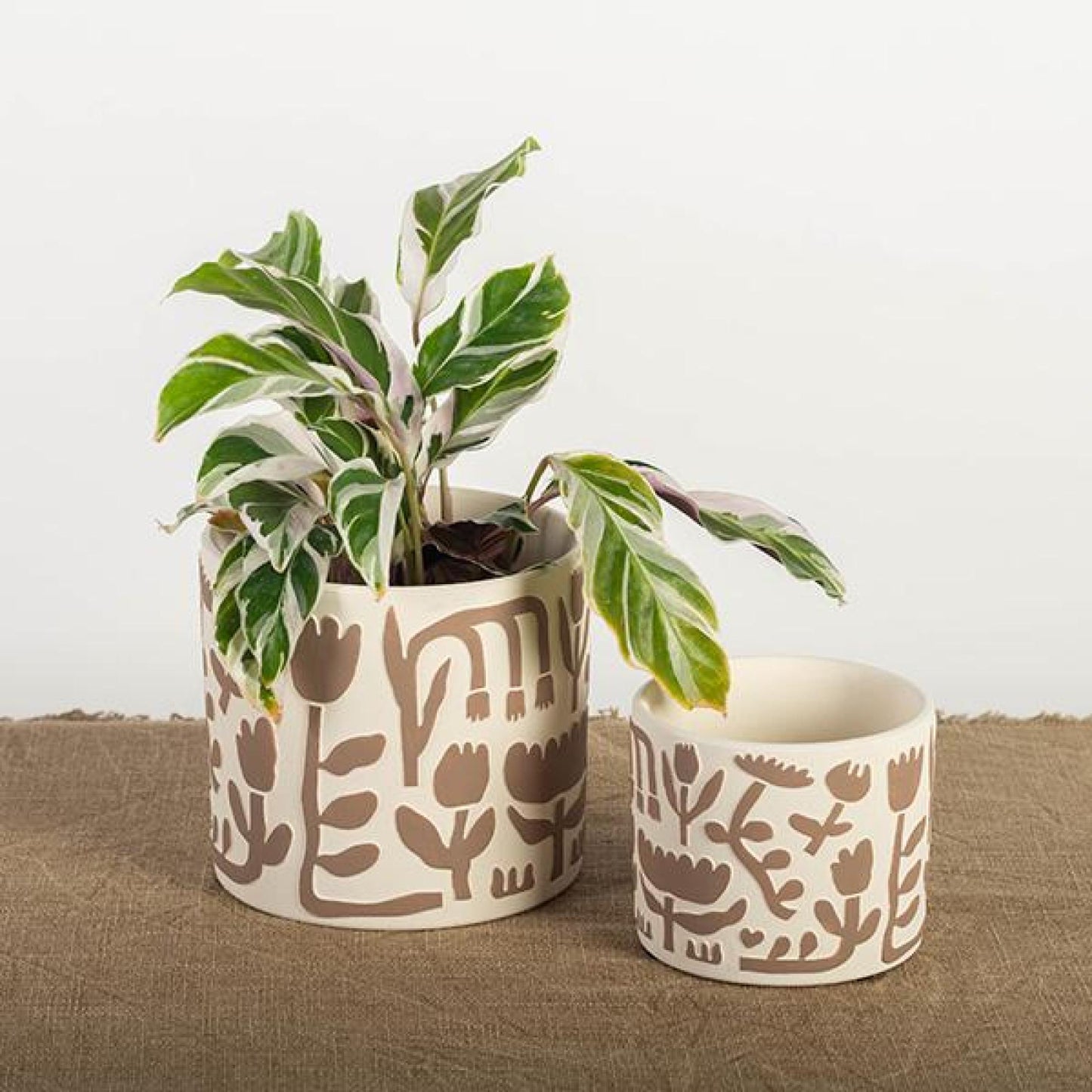 Set Of 2 Terracotta With Primitive Flower Patterns Planters