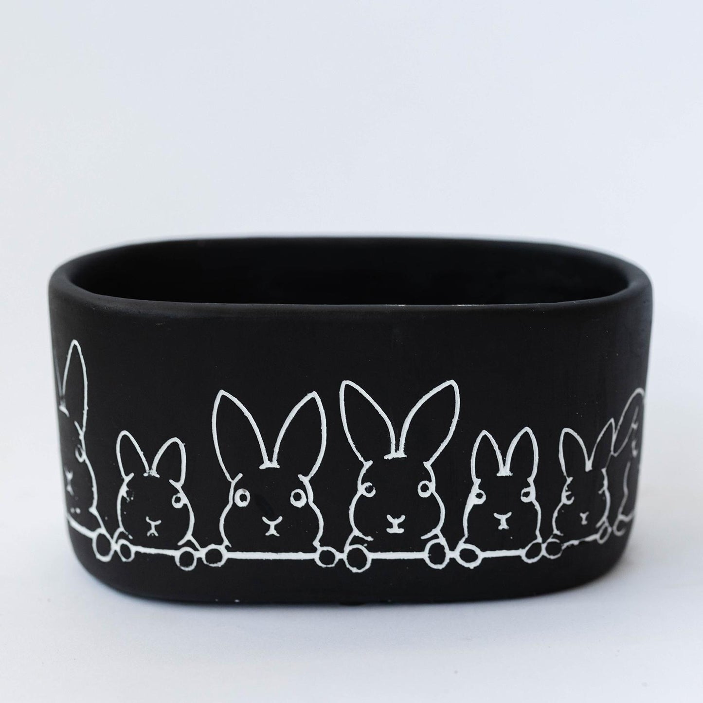 Oval Black With White Peeking Bunnies Pattern Planter