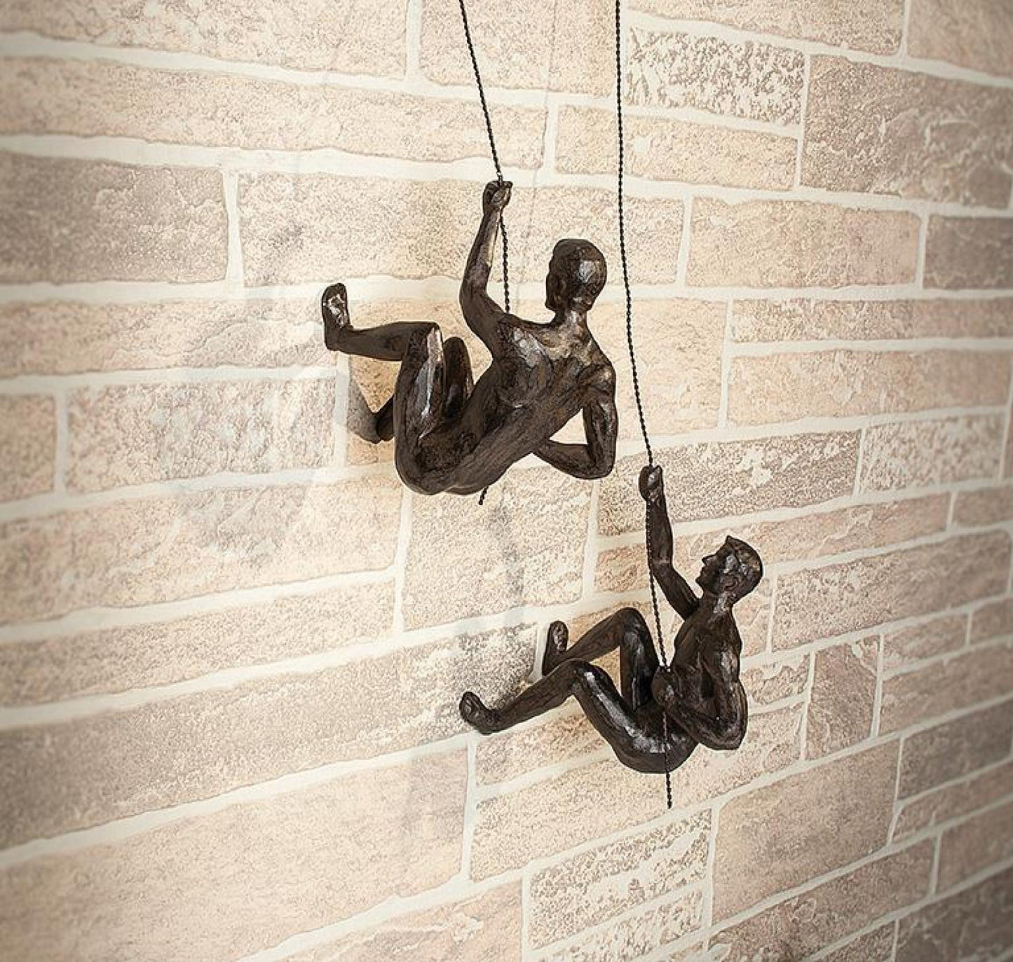 Set Of 2 Assorted Styles Climbing Man Figurines