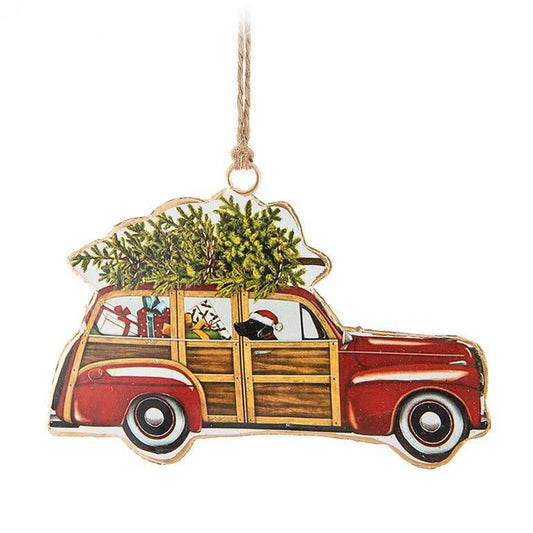 Dog In Woodie Wagon With A Christmas Tree Ornament