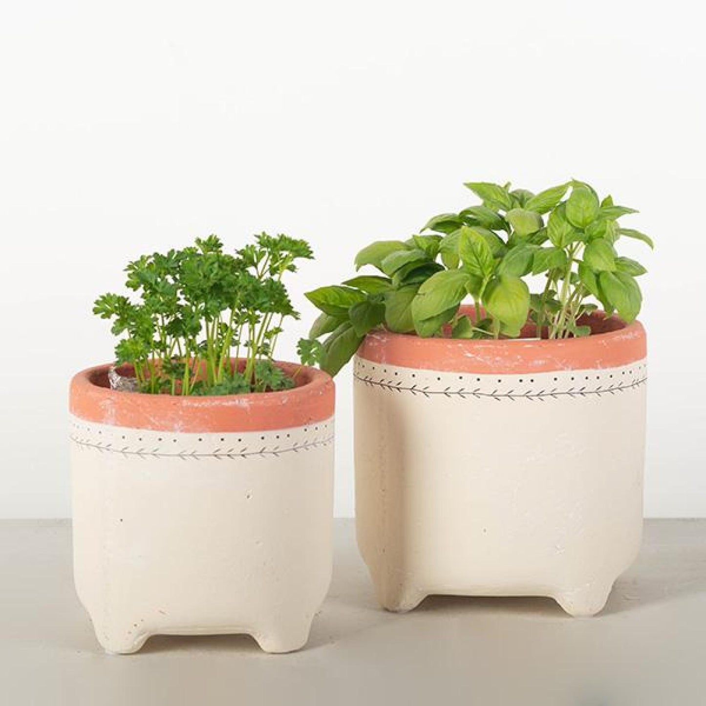 Set Of 2 Beige With Lines And Dots And Orange Trim Footed Planters