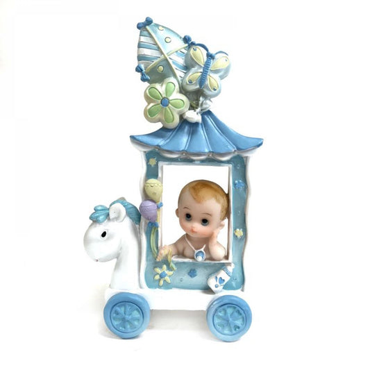 Baby With A Blue Necklace Sitting In A White And Blue Horse Cart Figurine