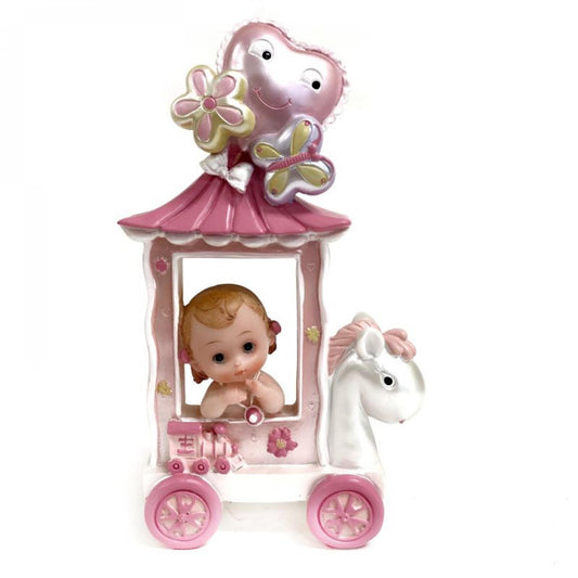 Baby With A Pink Necklace Sitting In A White And Pink Horse Cart Figurine