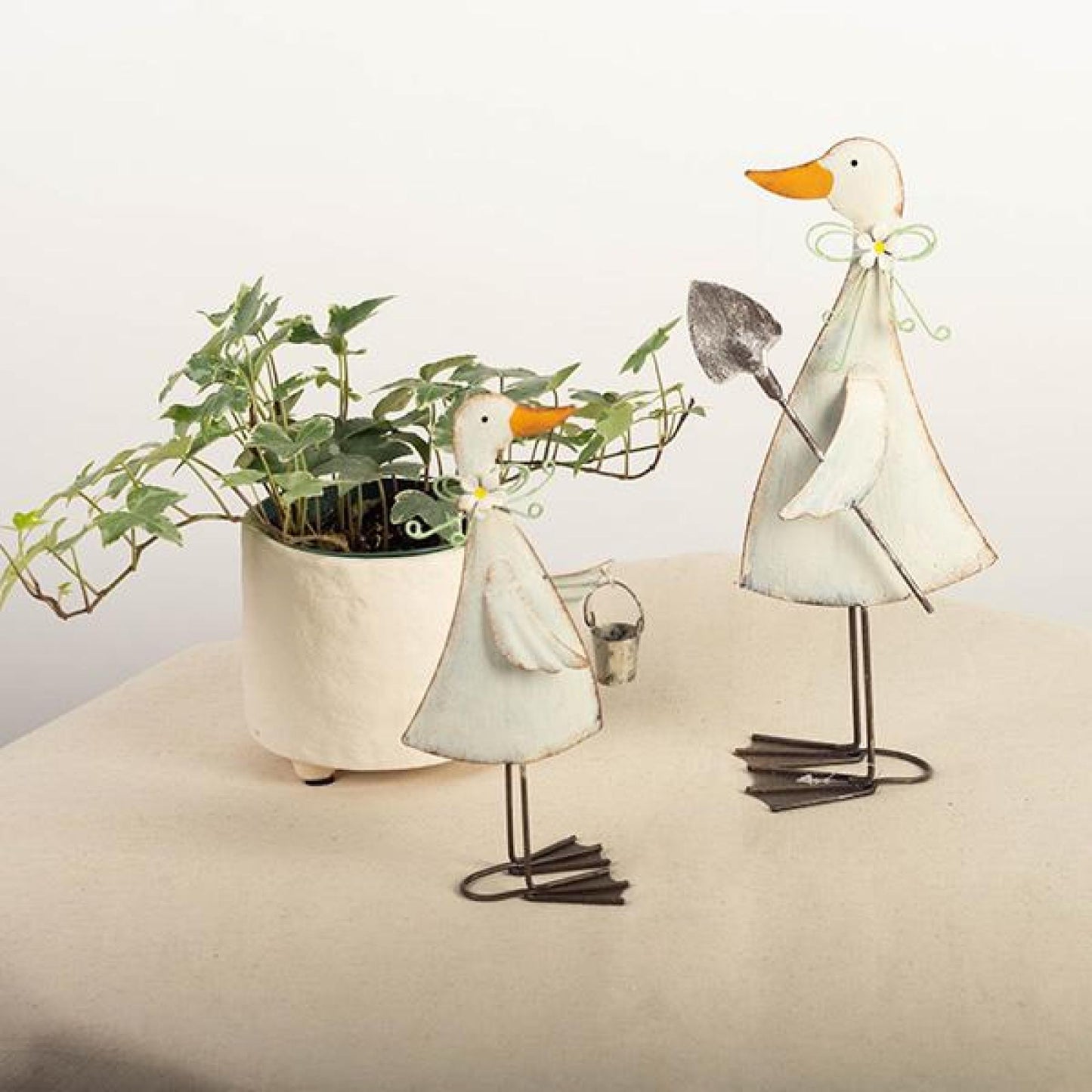 Set Of 2 Assorted Metal Ducks One Carrying A Bucket, The Other A Spade Figurine