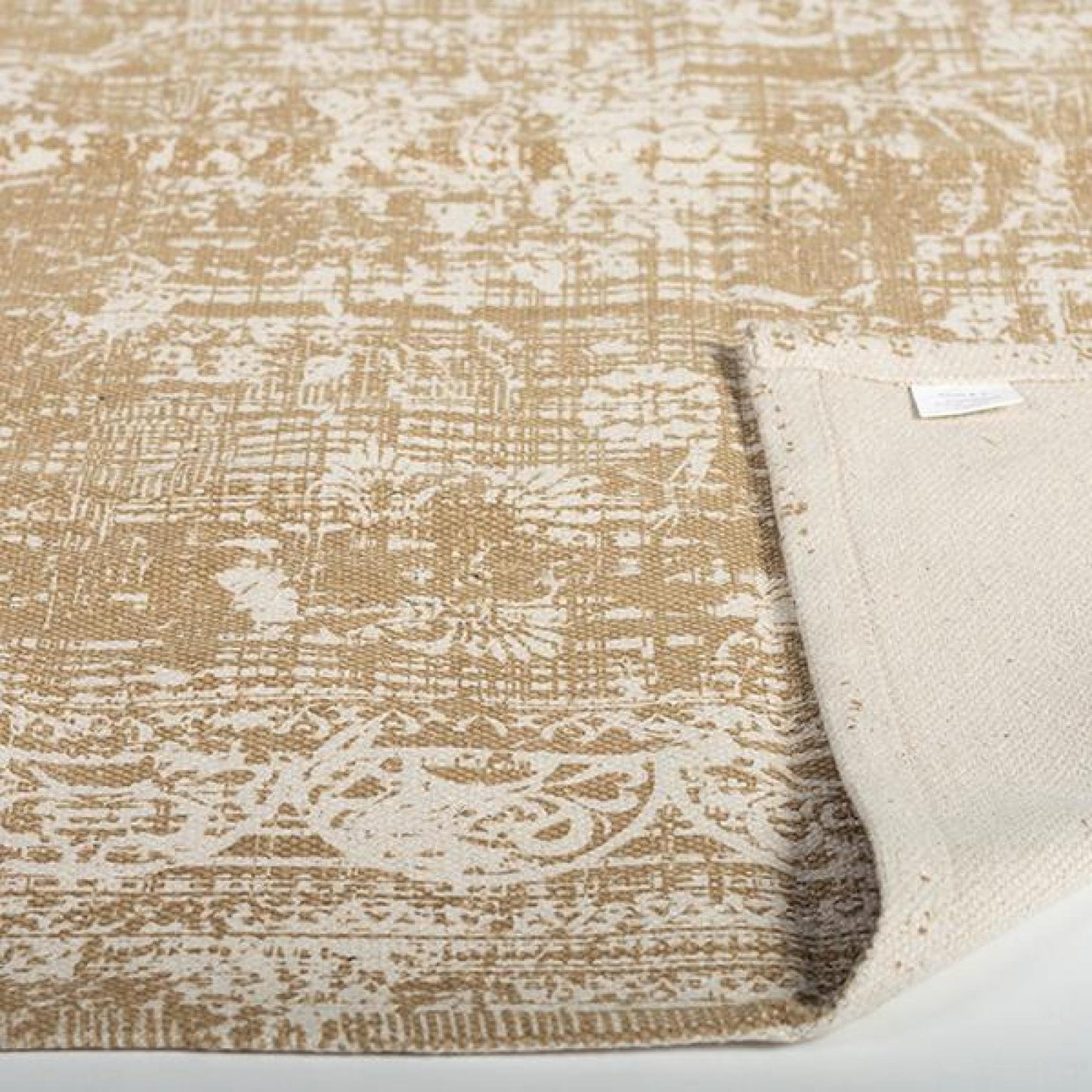 Light Brown And Ivory Patterned Rug