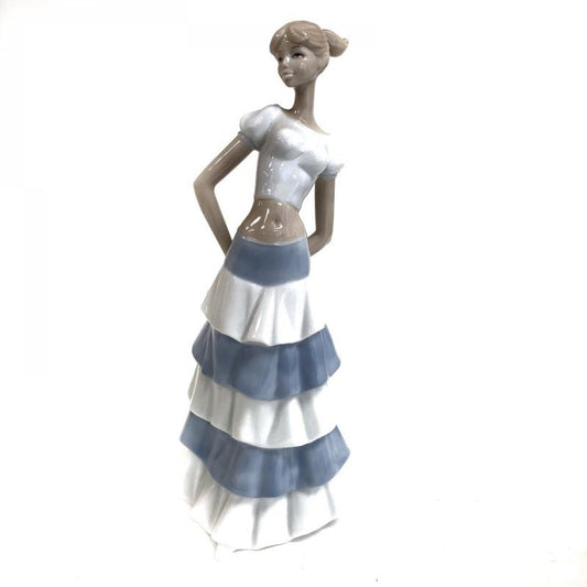 Girl In A Blue And White Striped Skirt Figurine