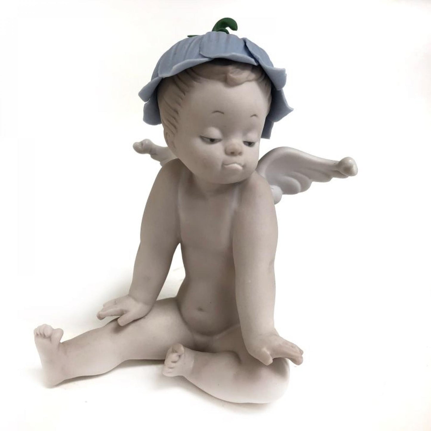 Cherub Boy Wearing A Leaf Hat Figurine